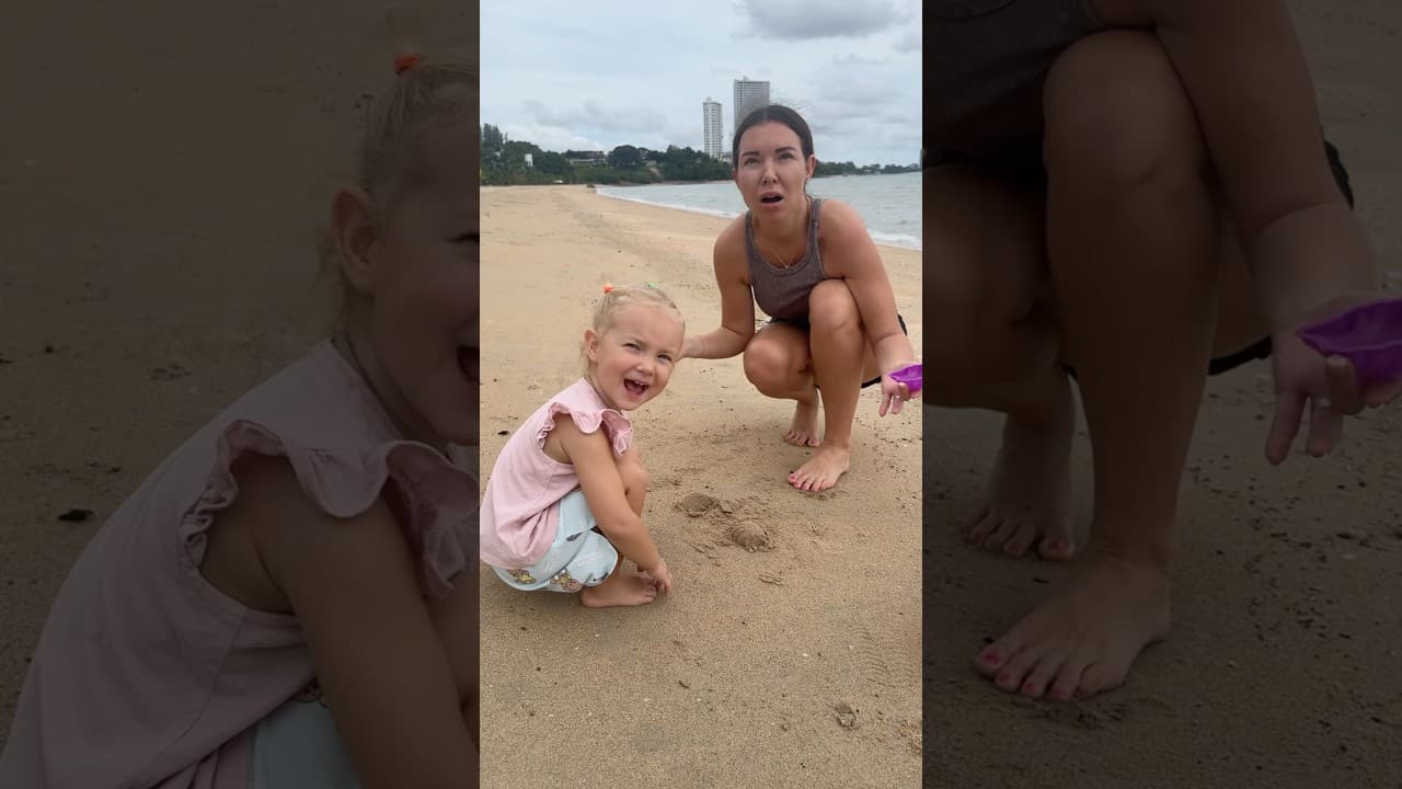 Daddy makes big sand castles