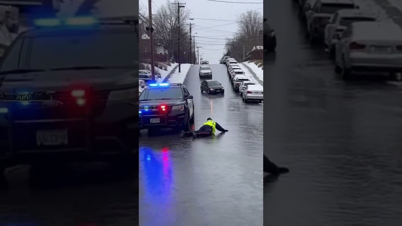 Officer Slips on Black Ice as Cars Slide Down Hill 🚓